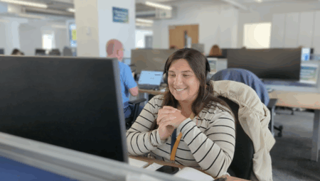 Customer Services assistant talking on the phone