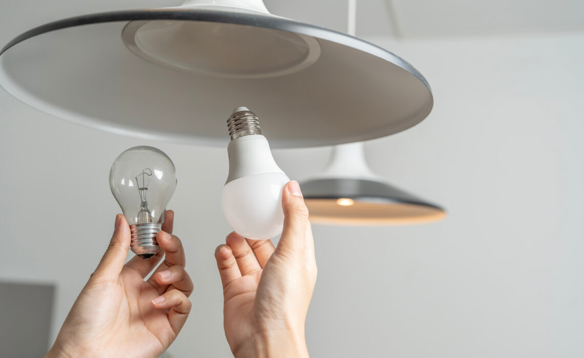 someone replacing a lightbulb